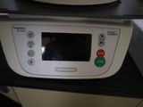 a microwave that is sitting on top of a shelf