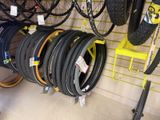 many different types of tires on display in a store