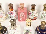 a lot of small vases that are sitting on a table