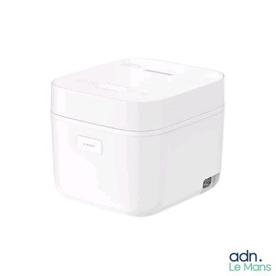 un cuiseur à riz blanc posé sur une table blanche
