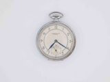 a silver pocket watch on a white surface with a blue second hand