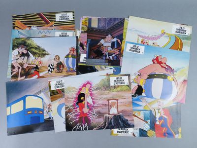 a lot of postcards of cartoon characters on a table