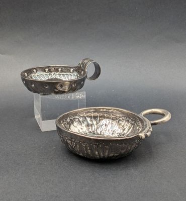 pair of silver plated bowls with handles and handles