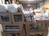many boxes stacked on top of each other in a warehouse