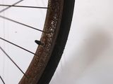 a close up of a bicycle wheel with a tire on it
