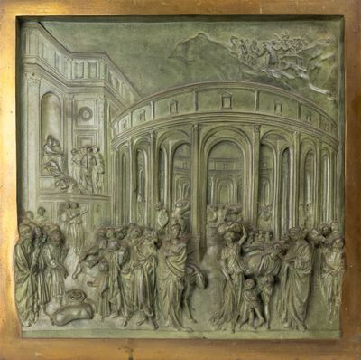 une image représentant un relief en bronze illustrant une scène à l'intérieur d'un bâtiment