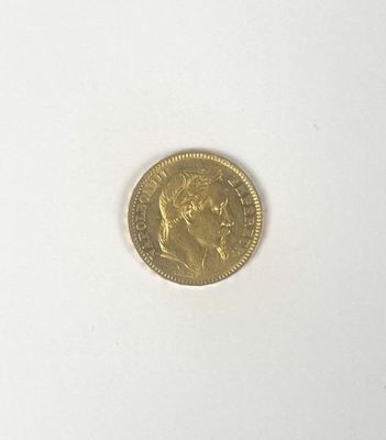 a gold coin with a picture of a woman on it
