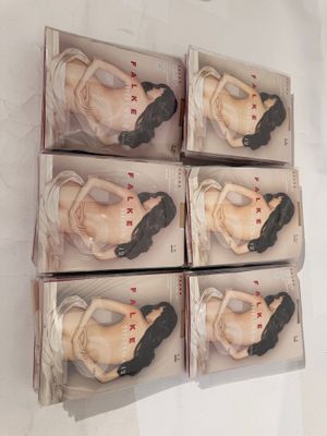 six boxes of assorted figurines of a woman in a dress