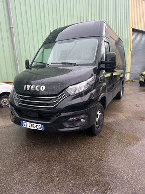 a black van parked in front of a building