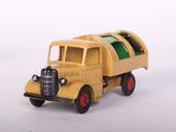 a yellow toy truck with a green stripe on the front