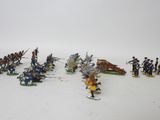 a lot of toy soldiers that are standing in the snow