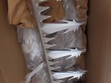 a cardboard box with a bunch of forks in it