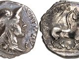 a close up of a coin with a horse on it