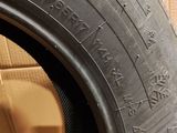 tire tread of a car on display in a shop window