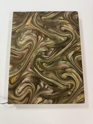 a close up of a piece of art that is on a table