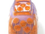 a purple vase with orange flowers on it on a white surface