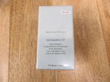 a box of skinceuticals sunscreen cream on a wooden table