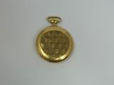 an image of a gold pocket watch on a white surface