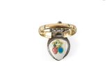 a close up of a ring with a flower on it