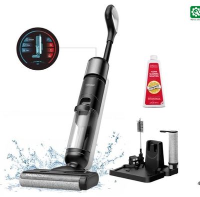 a close up of a black and silver vacuum cleaner and a toothbrush