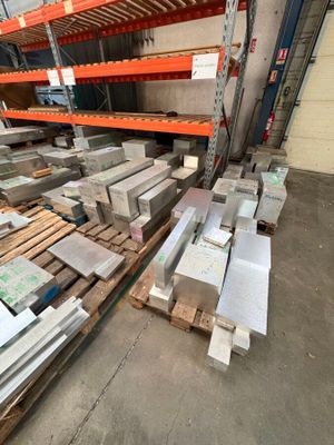 a large amount of boxes and pallets in a warehouse