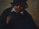 portrait of a man with a pipe smoking a cigarette in a black hat
