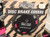 a box of disc brake covers sitting on a table