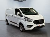 the new ford transit van is parked in a large room