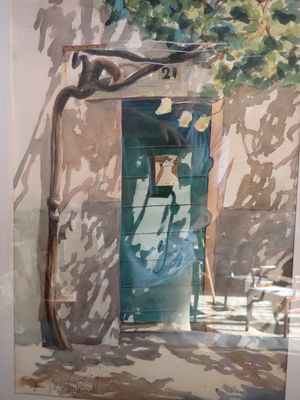 une photo d'un tableau représentant une porte et un arbre