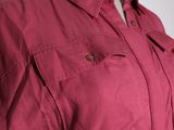 a close up of a pink shirt on a mannequin mannequin mannequin mannequin mannequin mannequin mannequin manne