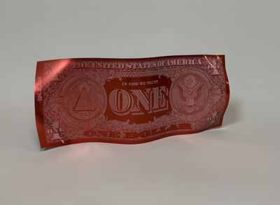 an image of a red one dollar bill on a white surface