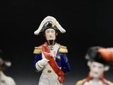 a figurine of a man in a military uniform