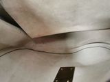 a close up of a piece of paper with a piece of tape on it