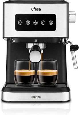 gros plan d'une machine à café avec deux tasses de café