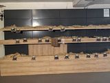 a large display of jars on the shelves in the store