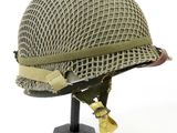 a close up of a military helmet on a stand