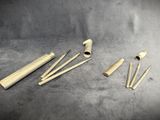 a group of tools sitting on top of a table next to each other