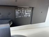 a close up of a computer monitor with a mouse on it