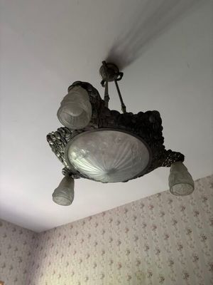 a light that is hanging from the ceiling in the room