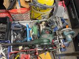 a pile of assorted tools sitting on the floor