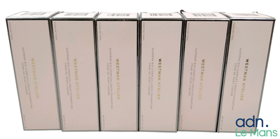 six books in a row sitting on top of each other on a white surface