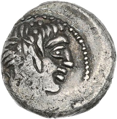 une pièce d'argent sur laquelle figure une tête de femme