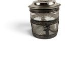 a glass jar with a picture of a man riding a bike