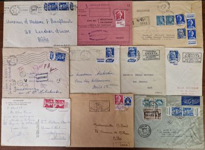 several old envelopes are sitting on top of a wooden table