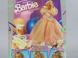 barbie ' s birthday barbie doll in a box with balloons and confetti