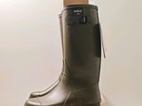 a pair of rain boots sitting on top of a box