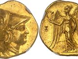 a gold coin with an image of a woman and a man on it