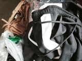 a box full of clothes and a pair of shoes