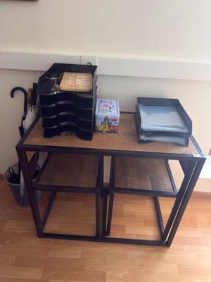 a small table with a bunch of items on top of it