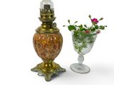 two vases that have flowers in them on the table